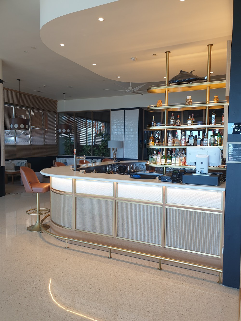 The curved brass and marble bar at the H10 Porto Poniente, Benidorm