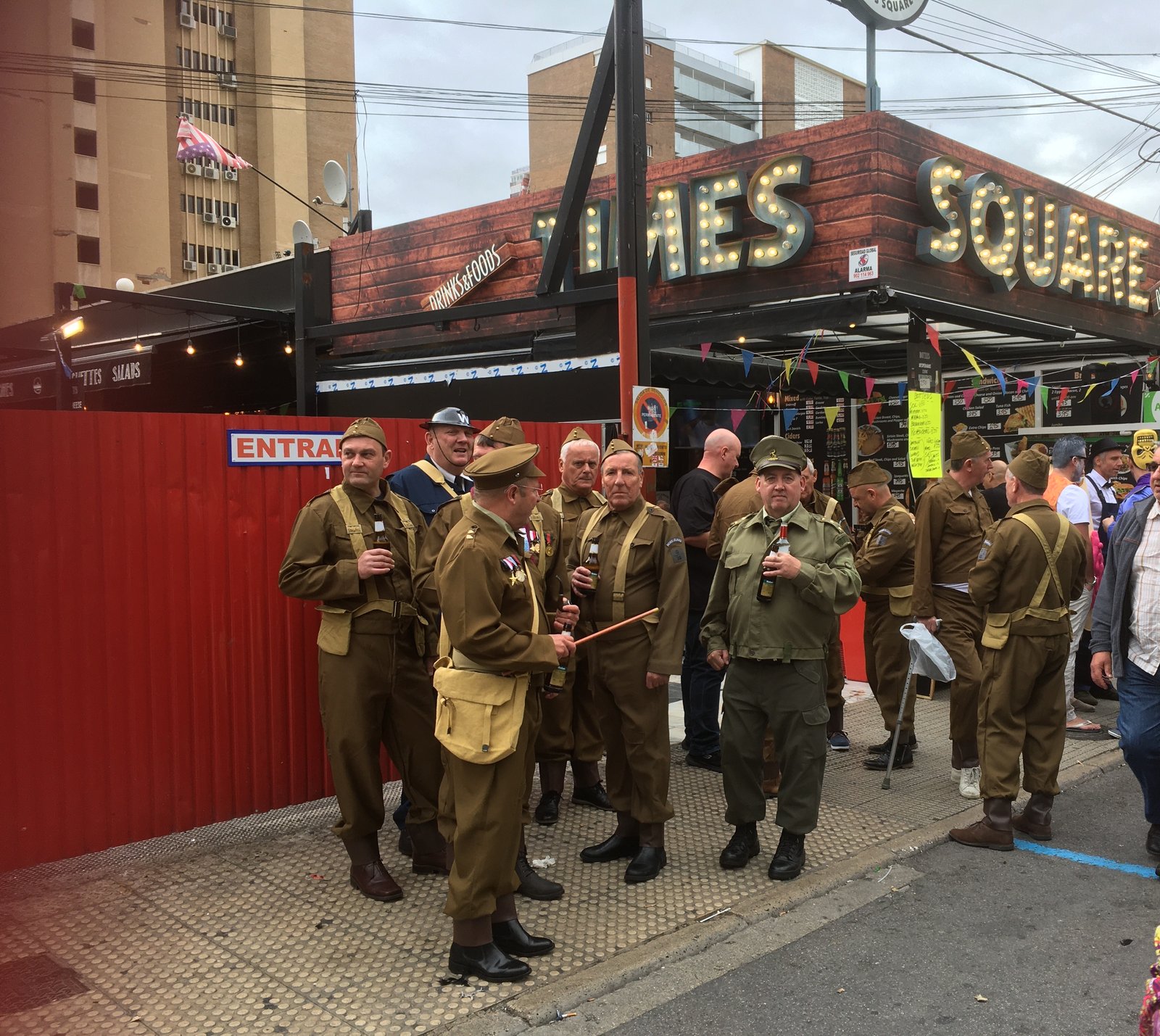 A group dressed as Dad's Army outside the Times Square bar on fancy dress day in Benidorm