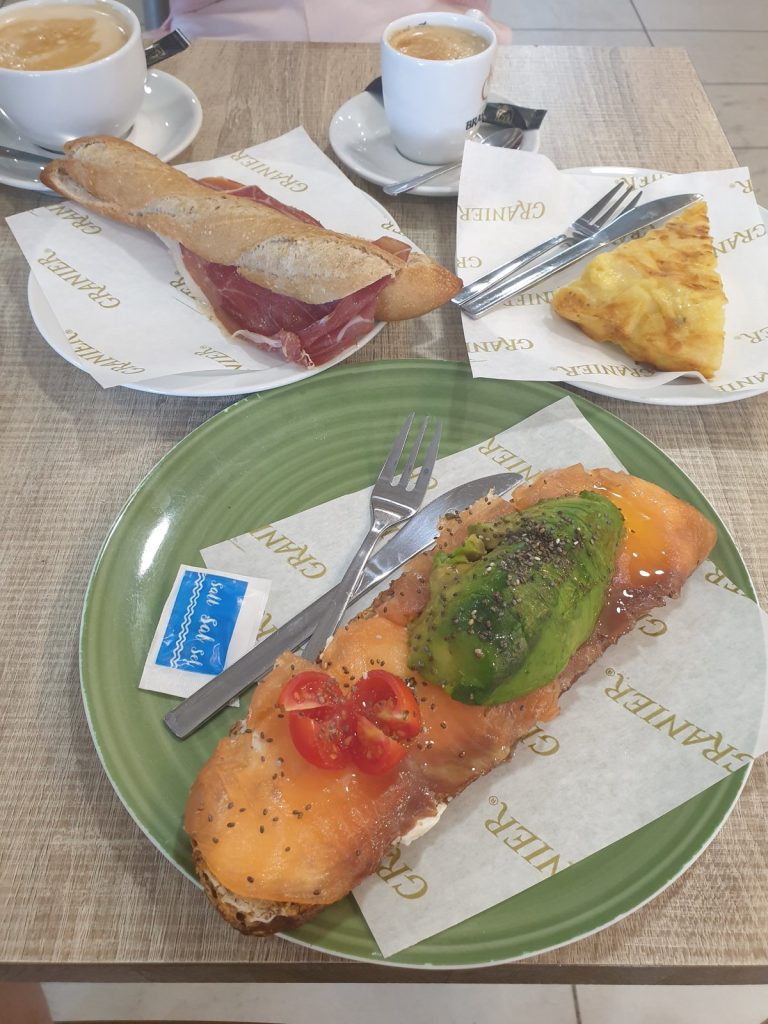 Breakfast at Granier bakery in Benidorm: salmon tostada, ham baguette, tortilla and coffee