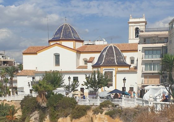 The church of Sant Jaume i Santa Anna with its blue-tiled domes, on the headland at the top of Benidorm Old Town